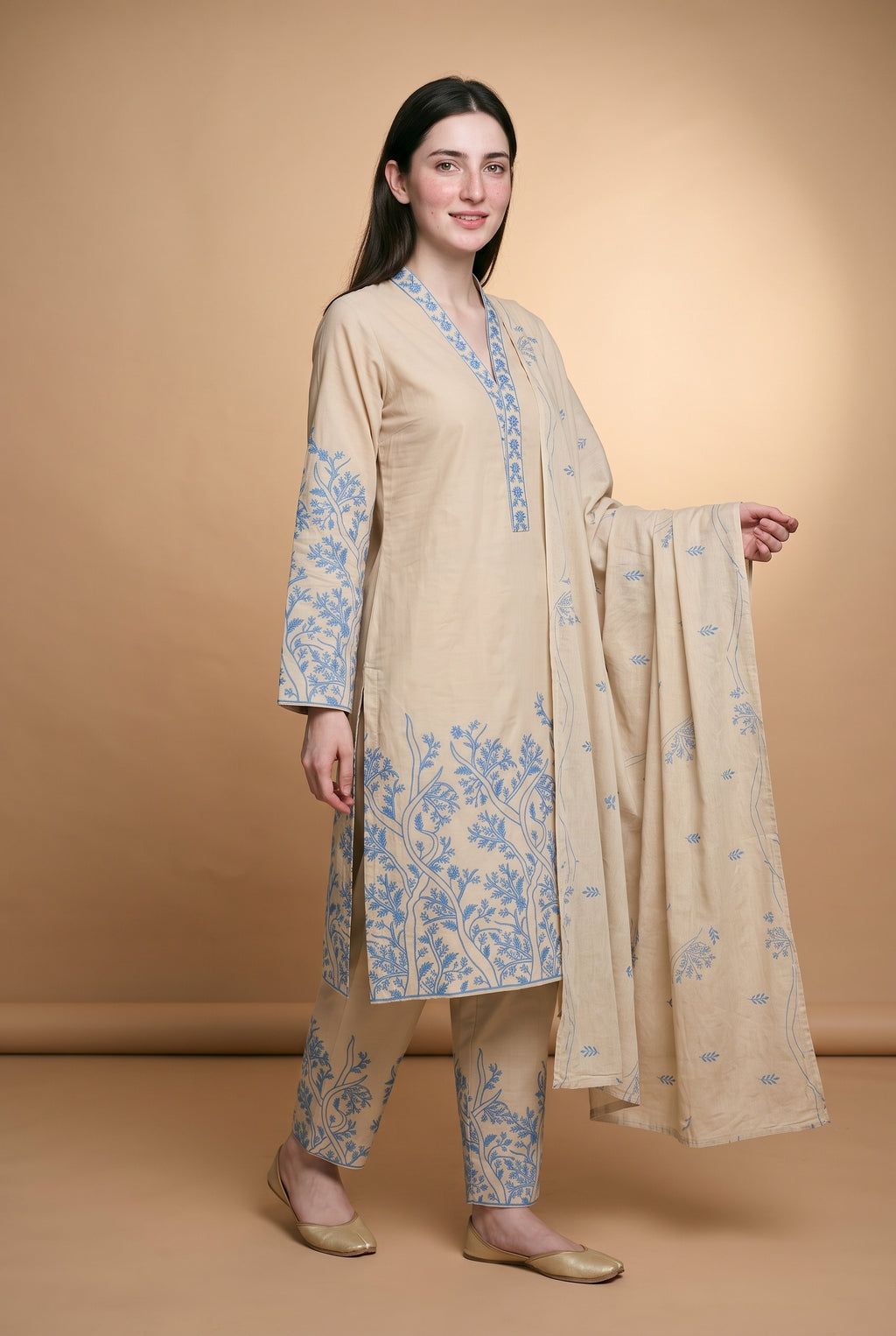Model wearing the Grove Suit in sand with blue tree embroidery, full-length front view with the dupatta