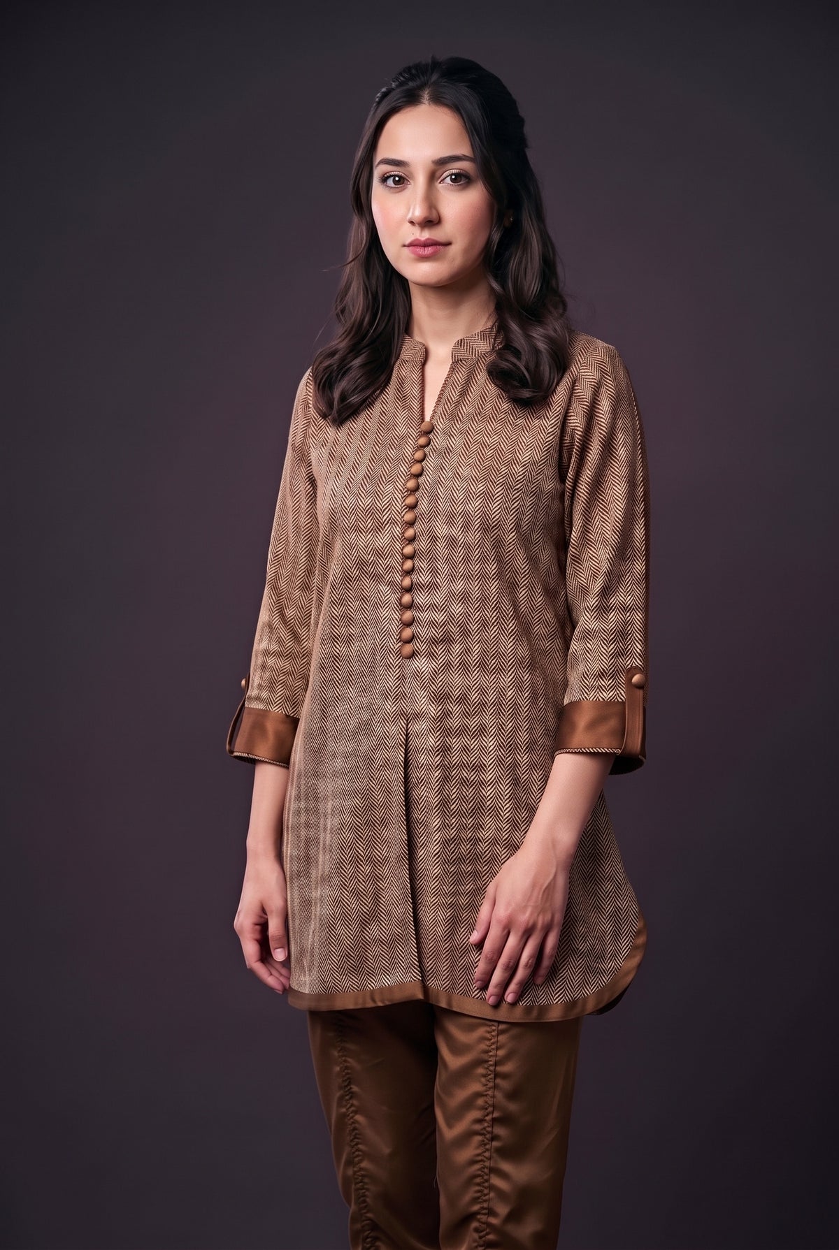 Model wearing the Bronze Herringbone Suit, showing the covered buttons and bronze cuffs