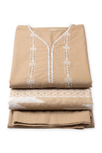Fawn Eyelet Suit folded to show the eyelet neckline, with the geometric-print dupatta and trousers