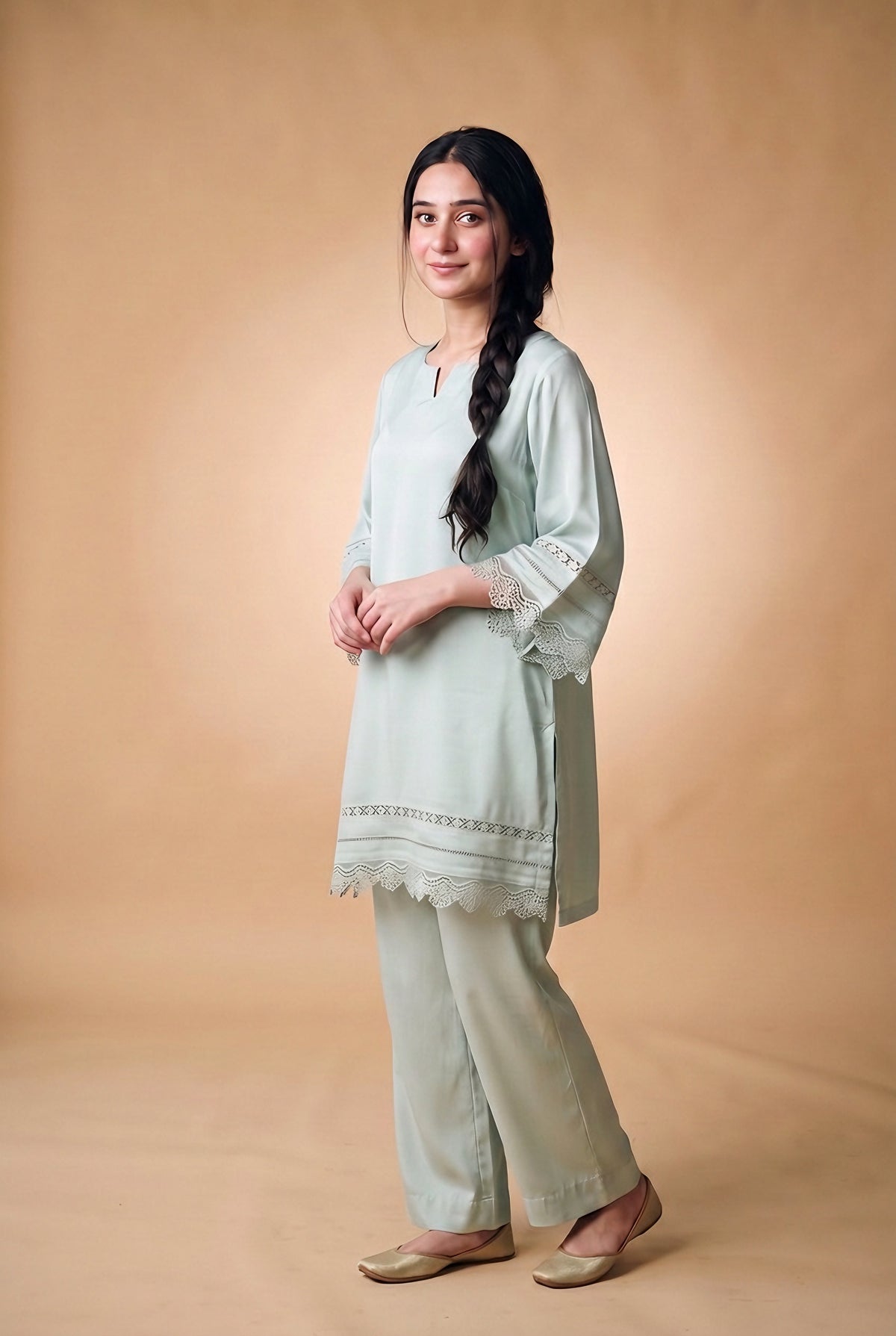Model wearing the Lace Trim Suit in mint, full-length view with wide-leg trousers