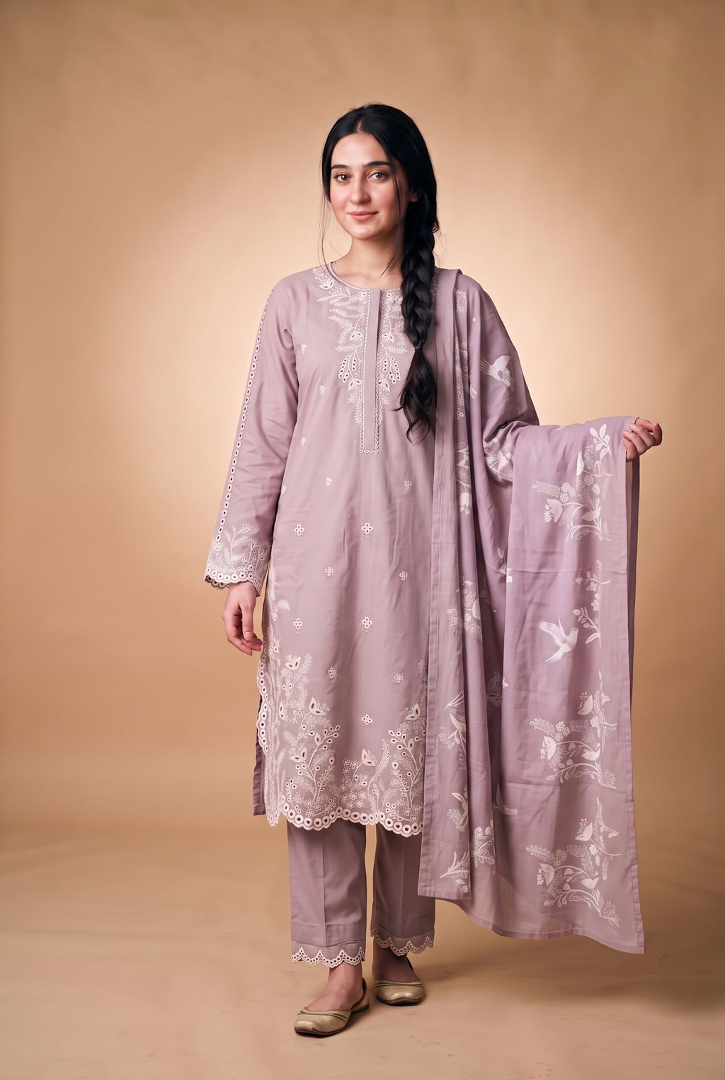 Model wearing the Lavender Eyelet Suit in lavender, full-length front view with the printed dupatta