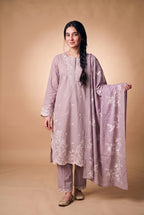 Model wearing the Lavender Eyelet Suit in lavender, full-length front view with the printed dupatta