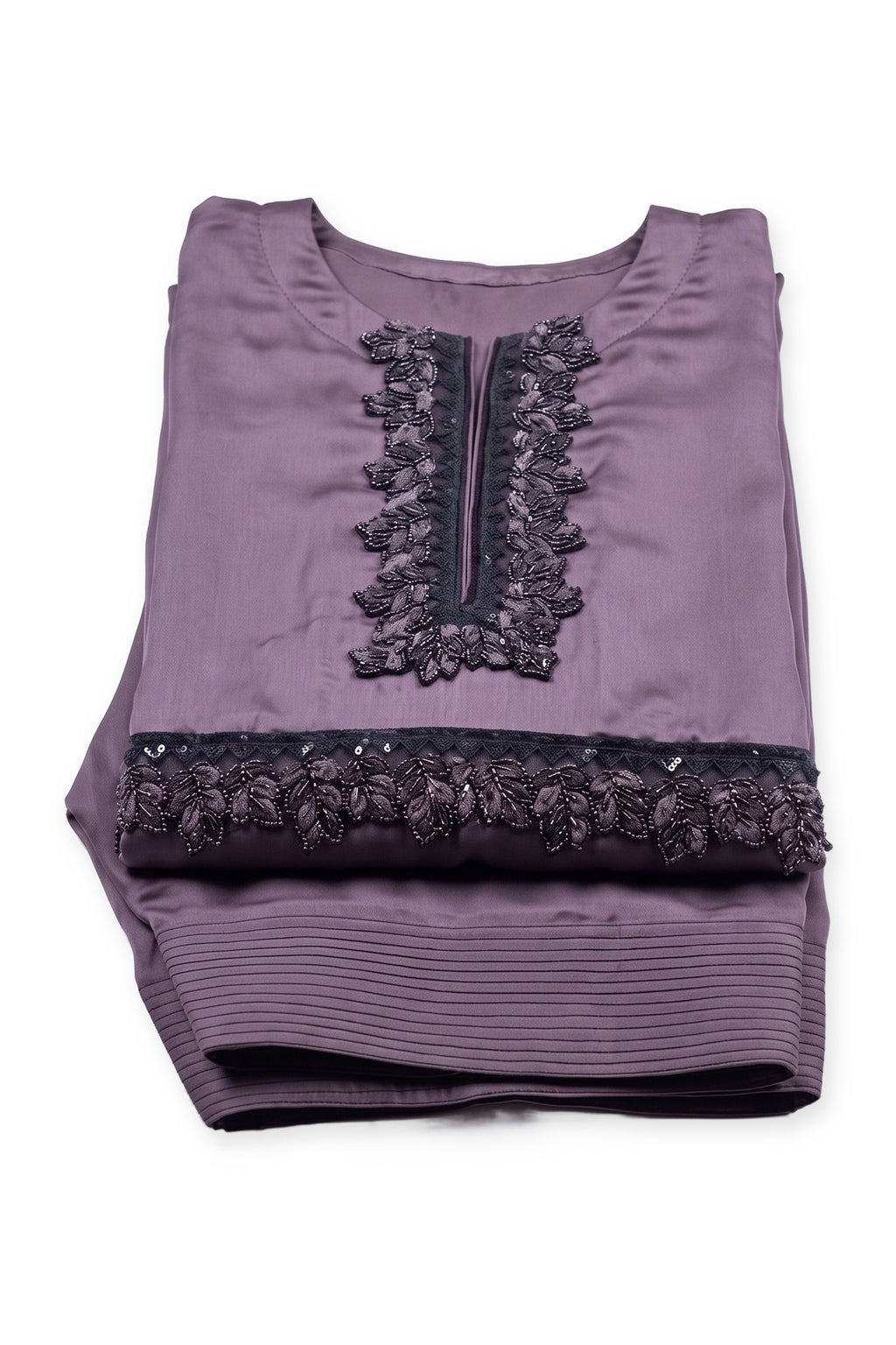 Mauve Noir Lace Suit folded to show the beaded lace neckline and hem, with the pintucked trousers