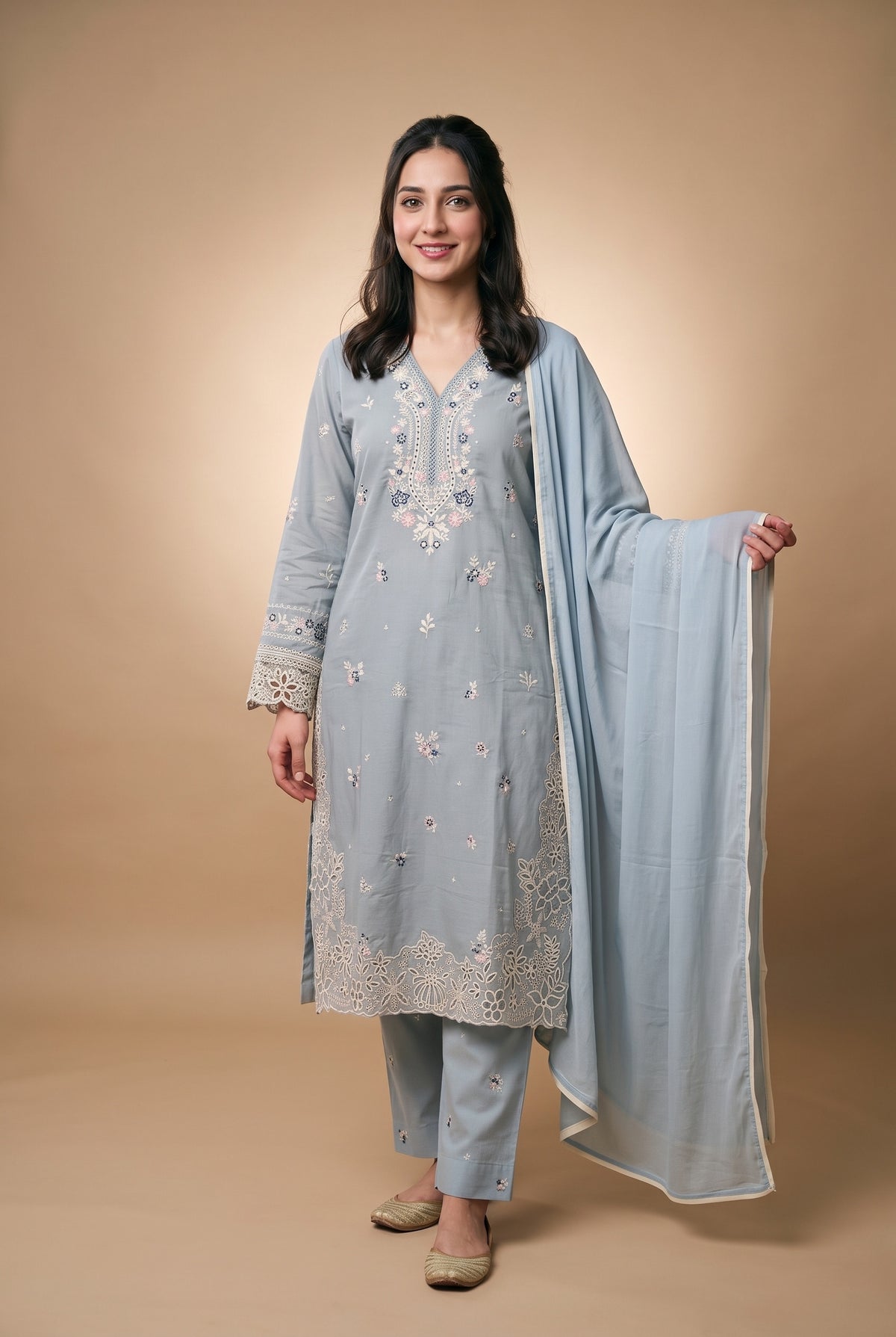 Model wearing the Misty Blue Cutwork Suit in powder blue, full-length front view with the dupatta