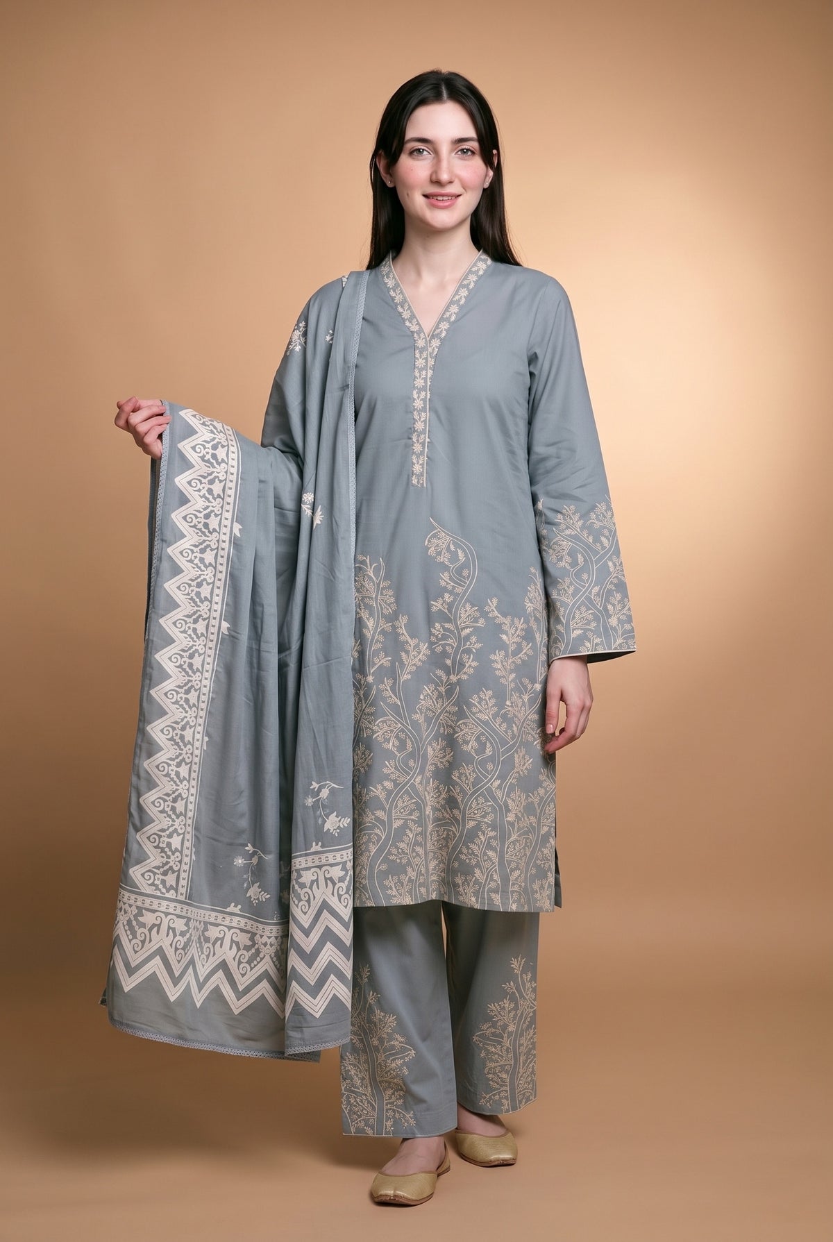 Model wearing the Grove Suit in grey blue with ivory tree embroidery, full-length front view with the dupatta