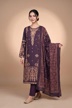 Model wearing the Mulberry Gilded Suit in mulberry purple, full-length front view with the paisley dupatta