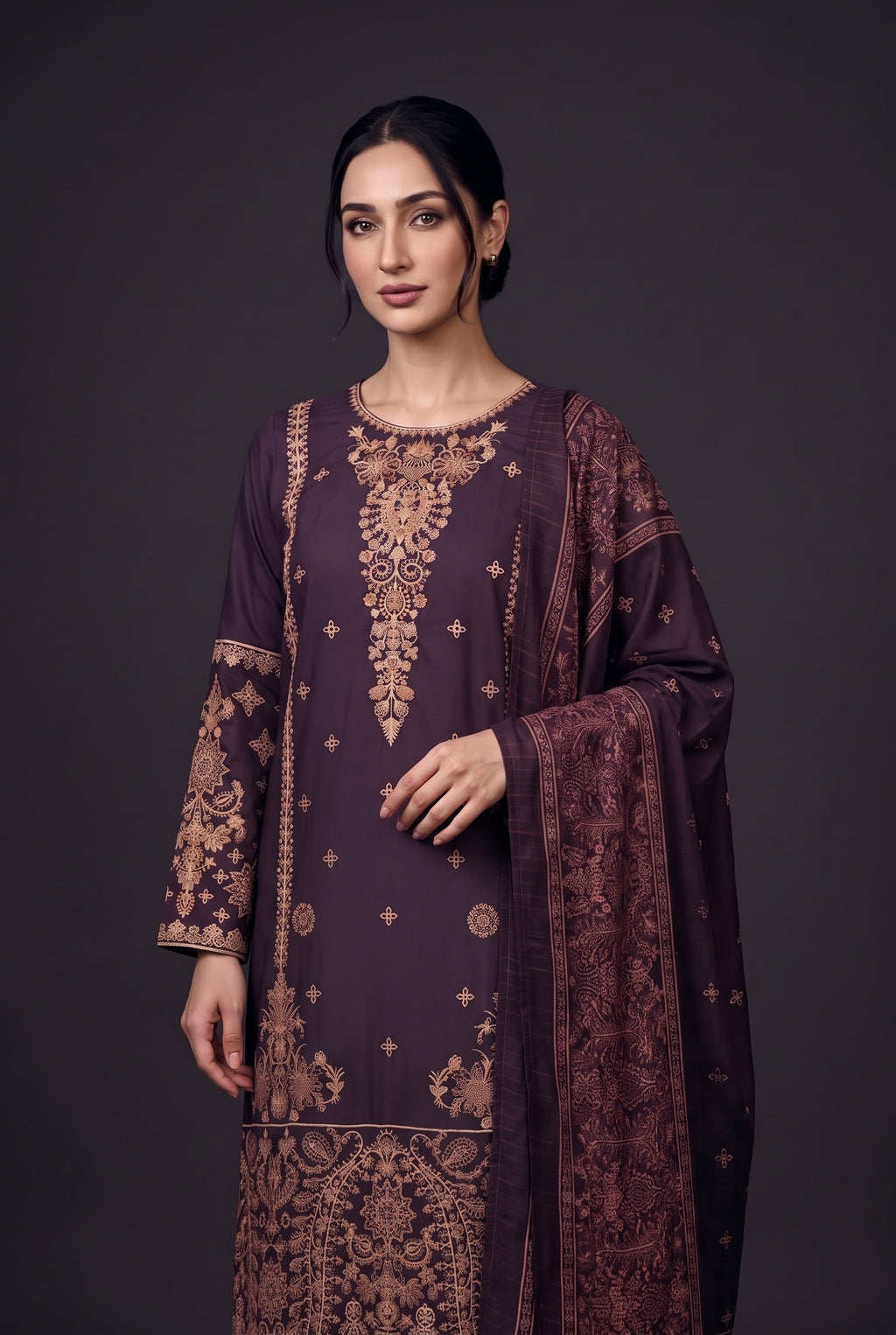 Model wearing the Mulberry Gilded Suit, showing the gold embroidered neckline and sleeves