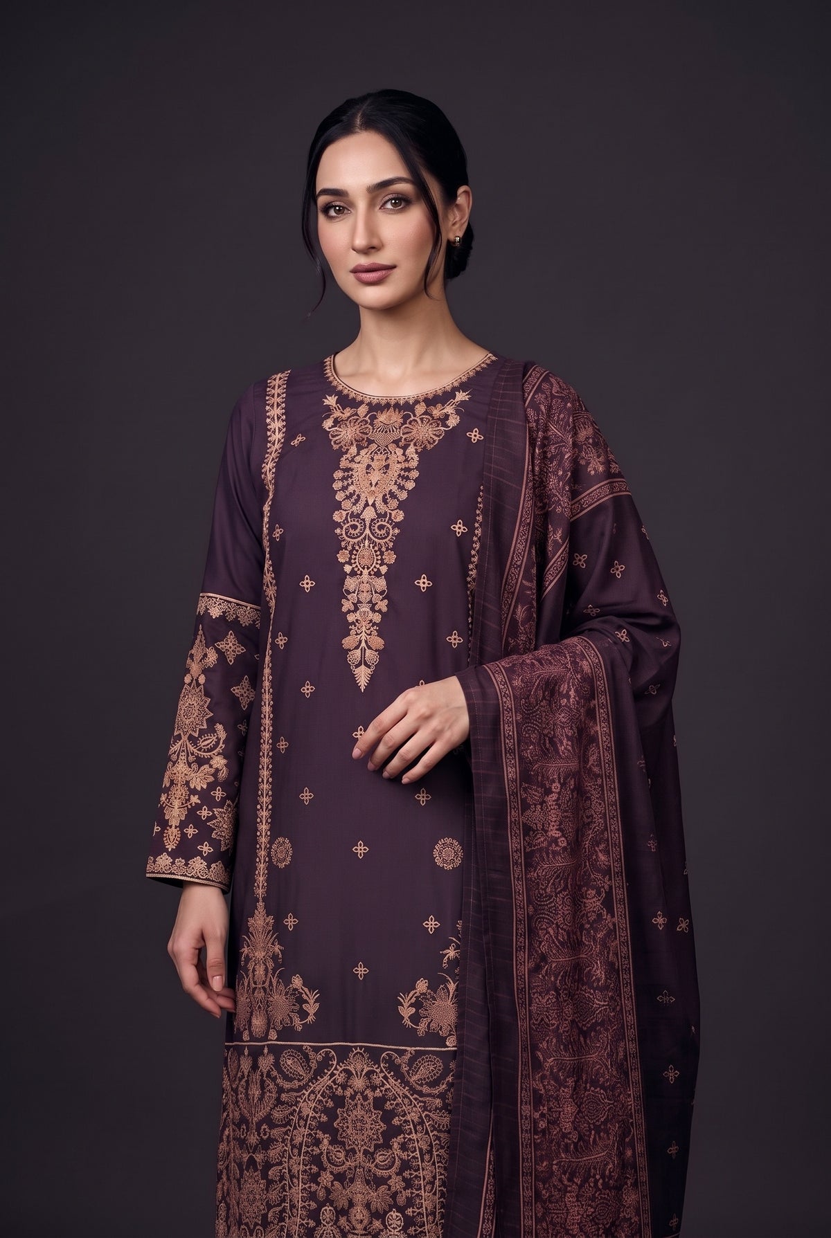 Model wearing the Mulberry Gilded Suit, showing the gold embroidered neckline and sleeves
