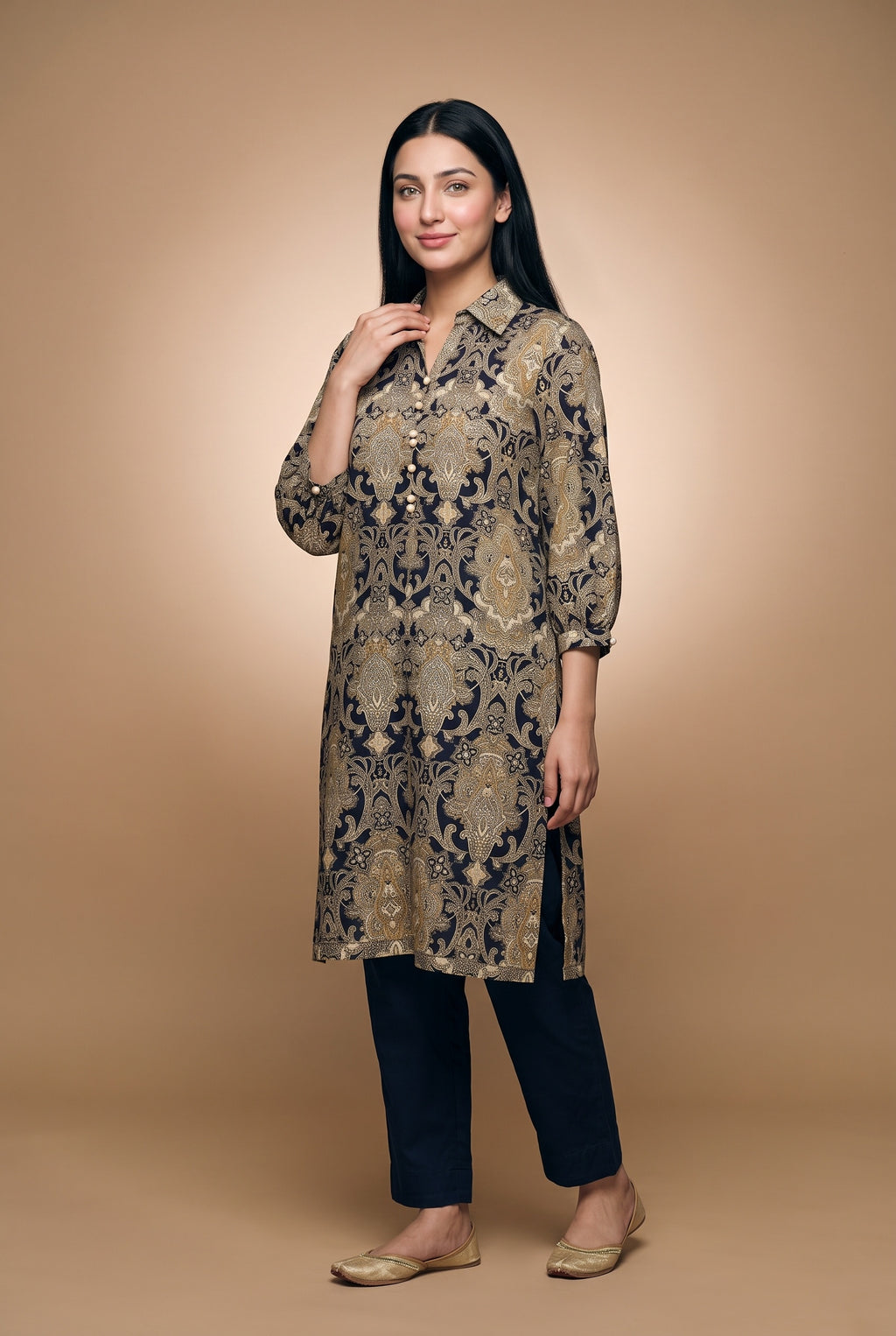 Model wearing the Navy Damask Pearl Suit in navy damask print with navy trousers, full-length front view