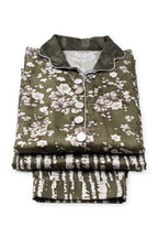 Olive Blossom Suit folded to show the scalloped collar and buttons, with the zebra-stripe trousers