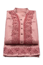 Rose Lotus Lace Suit folded to show the lace panels and covered buttons, with the lace-trimmed trousers