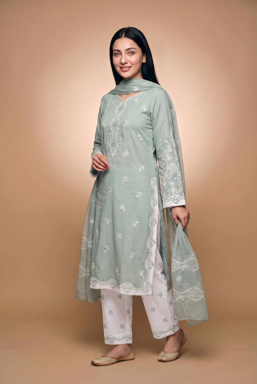 Model wearing the Sage Scallop Eyelet Suit in sage green with off-white trousers, full-length front view with the dupatta